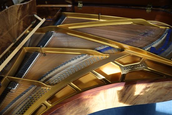A Bluthner Model 6 flame mahogany cased grand piano, W.4ft 10in. L.6ft 3in. H.3ft 3in.